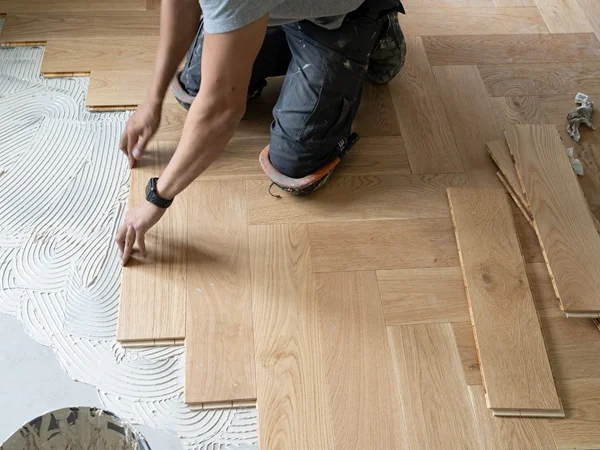 Herringbone SPC flooring installation detail in Malaysia
