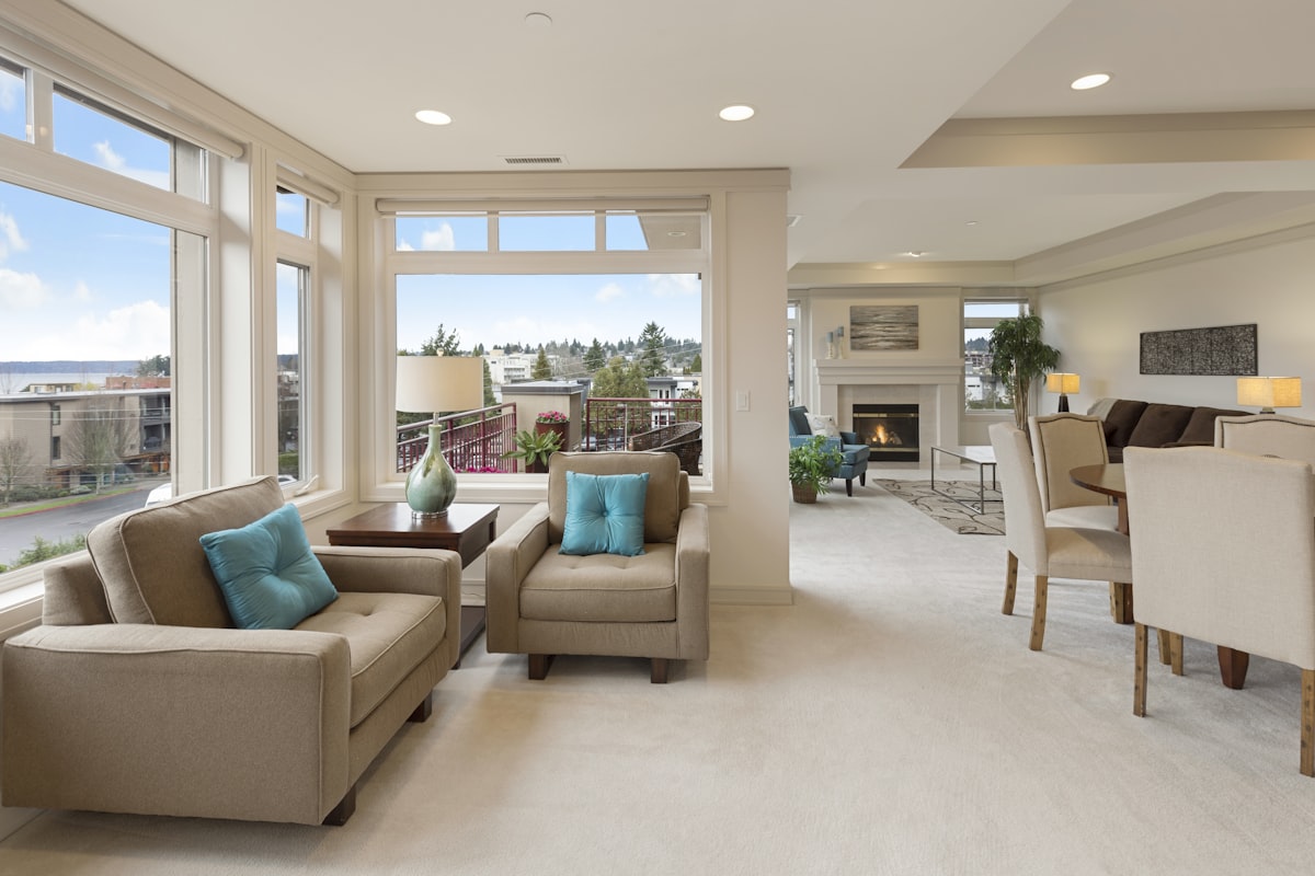 Asian family playing in modern living room with bamboo flooring